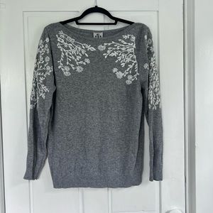 Grey sweater with white embroidery